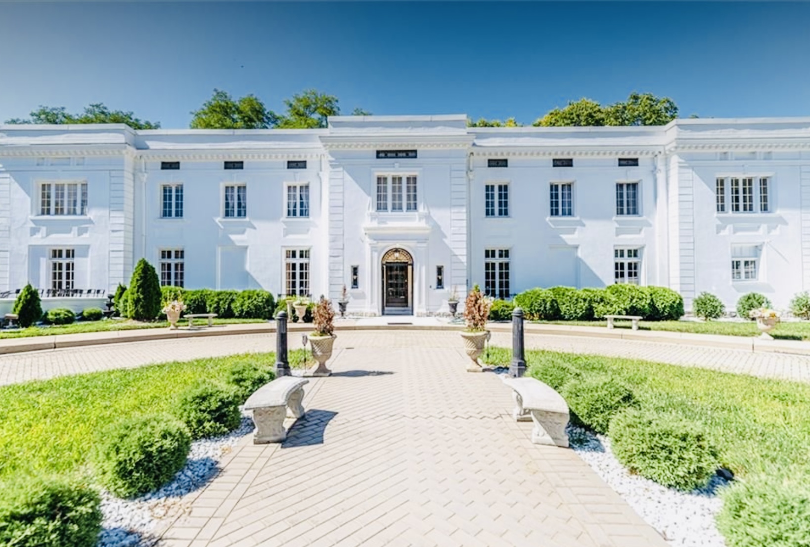 The Mansion front entrance with elegant courtyard